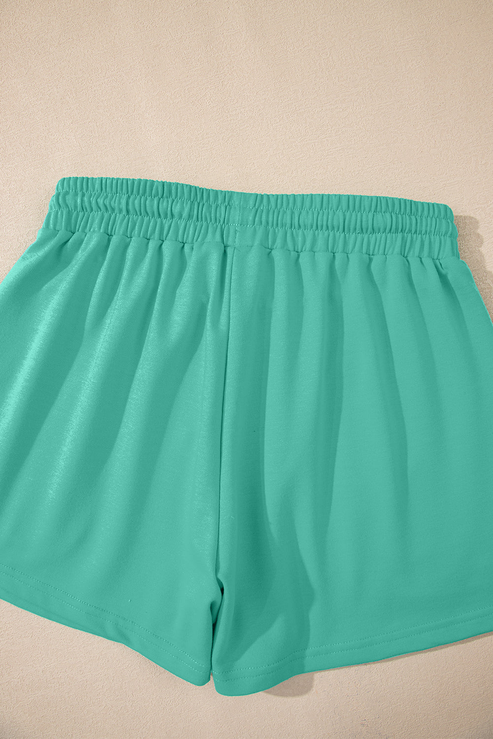 Meadow Mist Green Solid Loose V Neck Half Sleeve Tee and Shorts Set