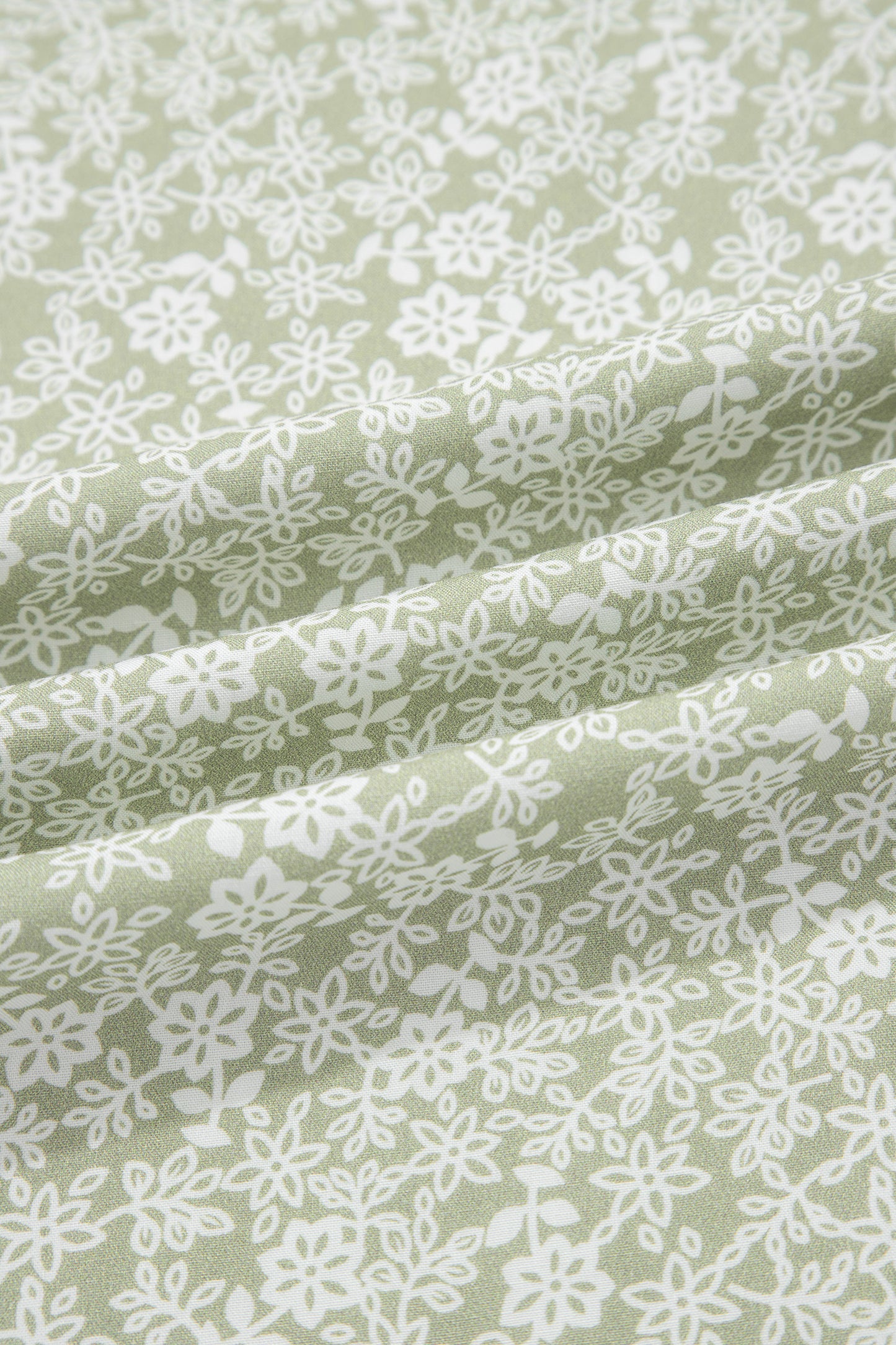 Green Smocked Bodice Square Neck Sleeveless Floral Jumpsuit