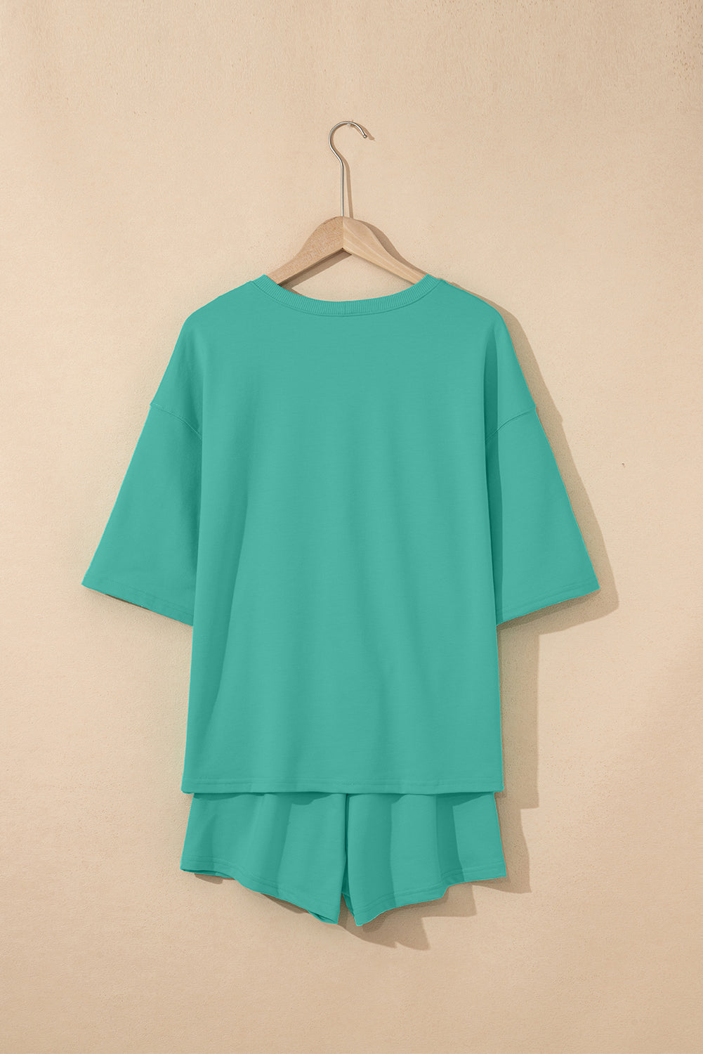 Meadow Mist Green Solid Loose V Neck Half Sleeve Tee and Shorts Set