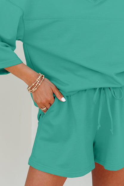 Meadow Mist Green Solid Loose V Neck Half Sleeve Tee and Shorts Set