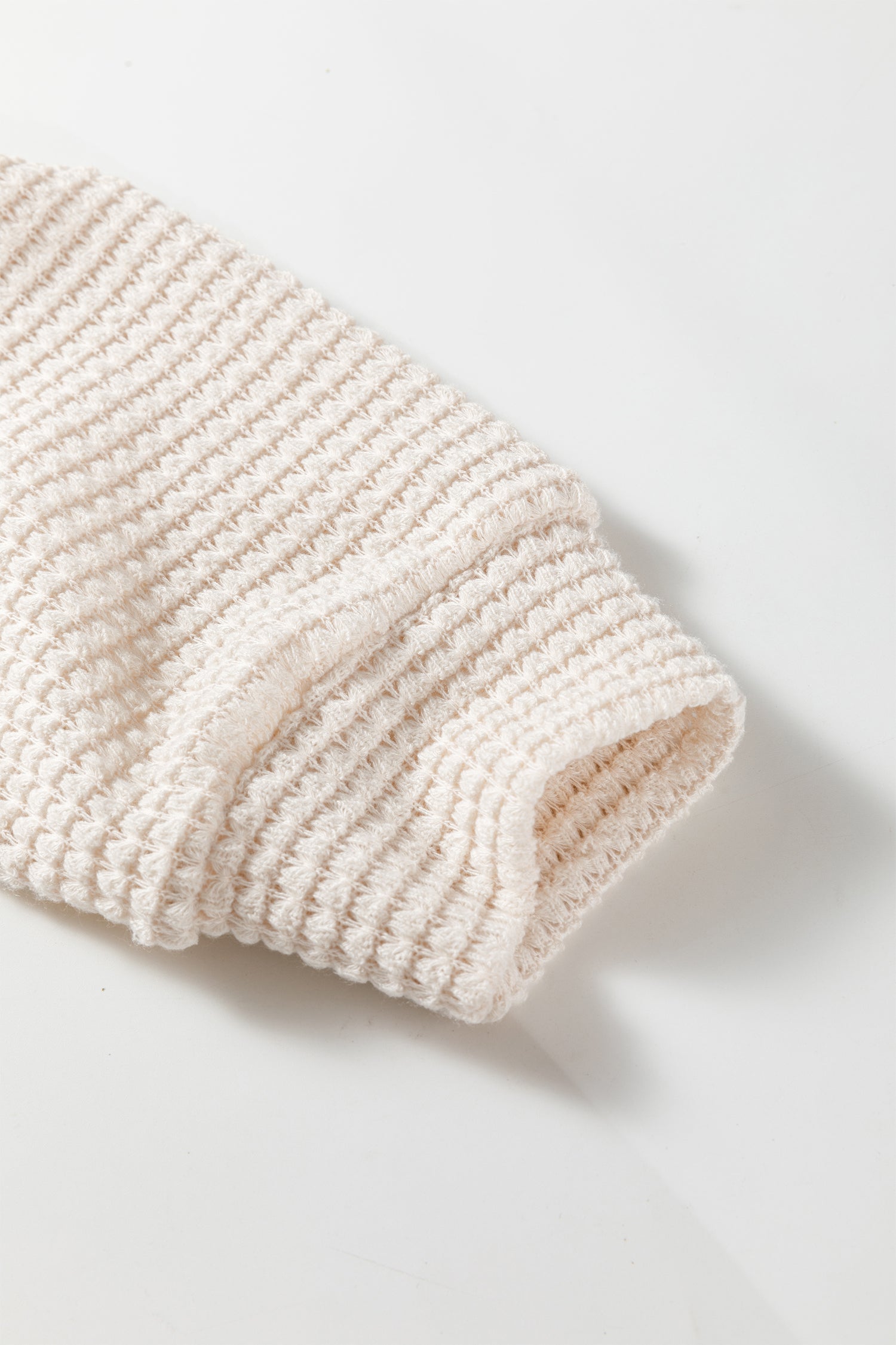 Jet Stream Solid Color Textured Knit Asymmetric Shoulder Long Sleeve Top