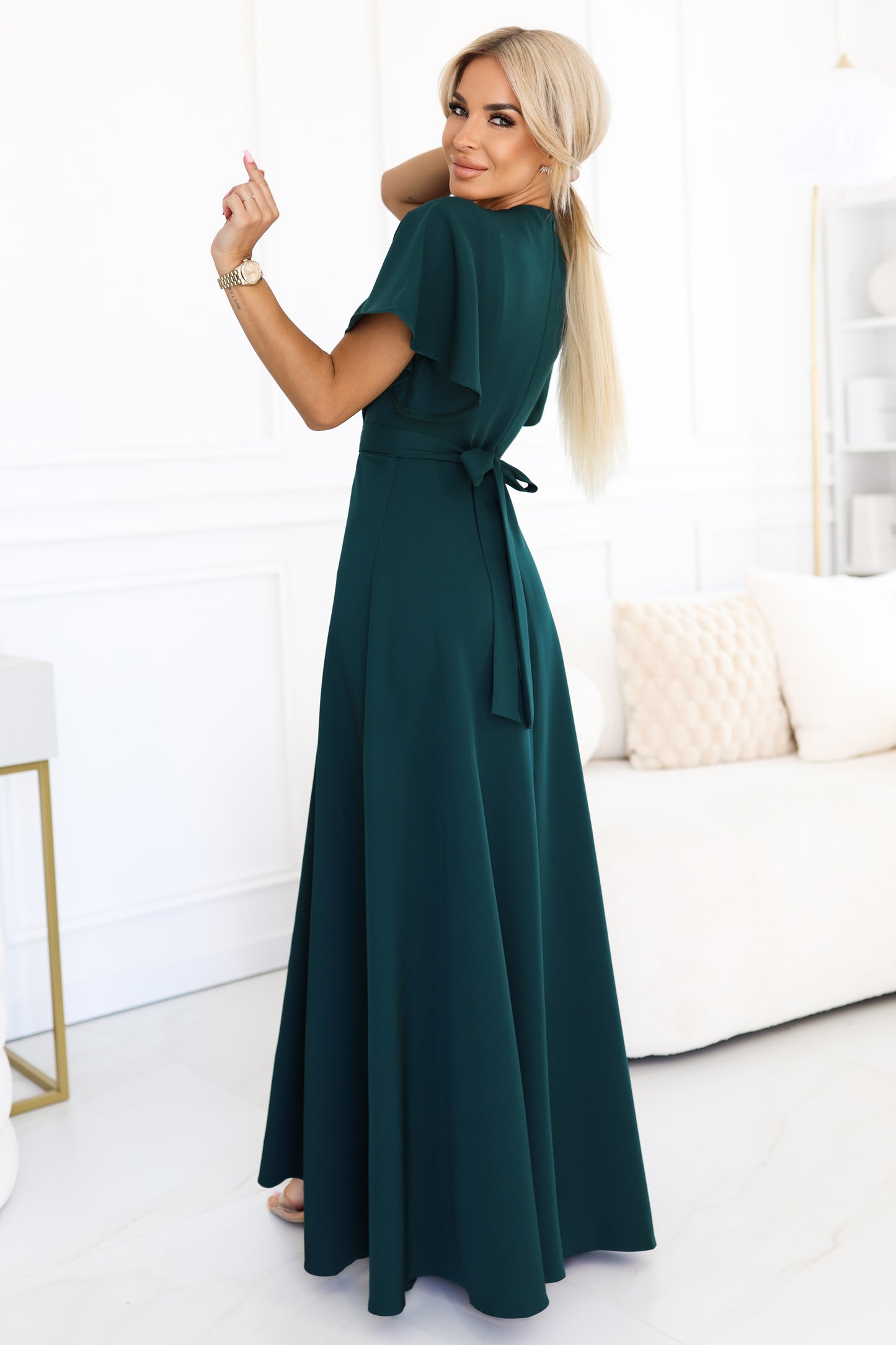 581-8 JENNIFER long dress with a leg slit, sleeves and a neckline - bottle green
