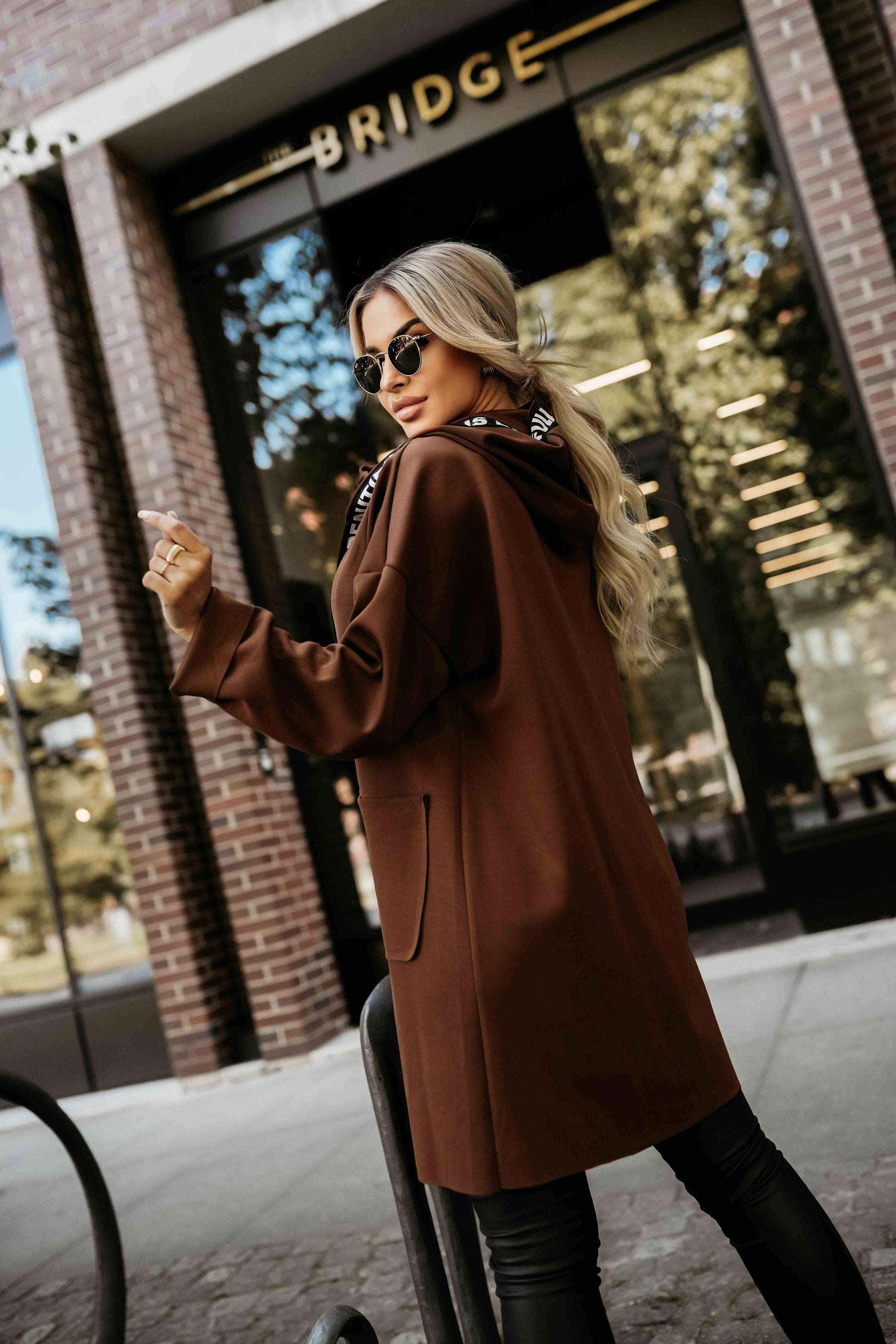 632-2 Casual coat with a zipper and fashionable details - chocolate