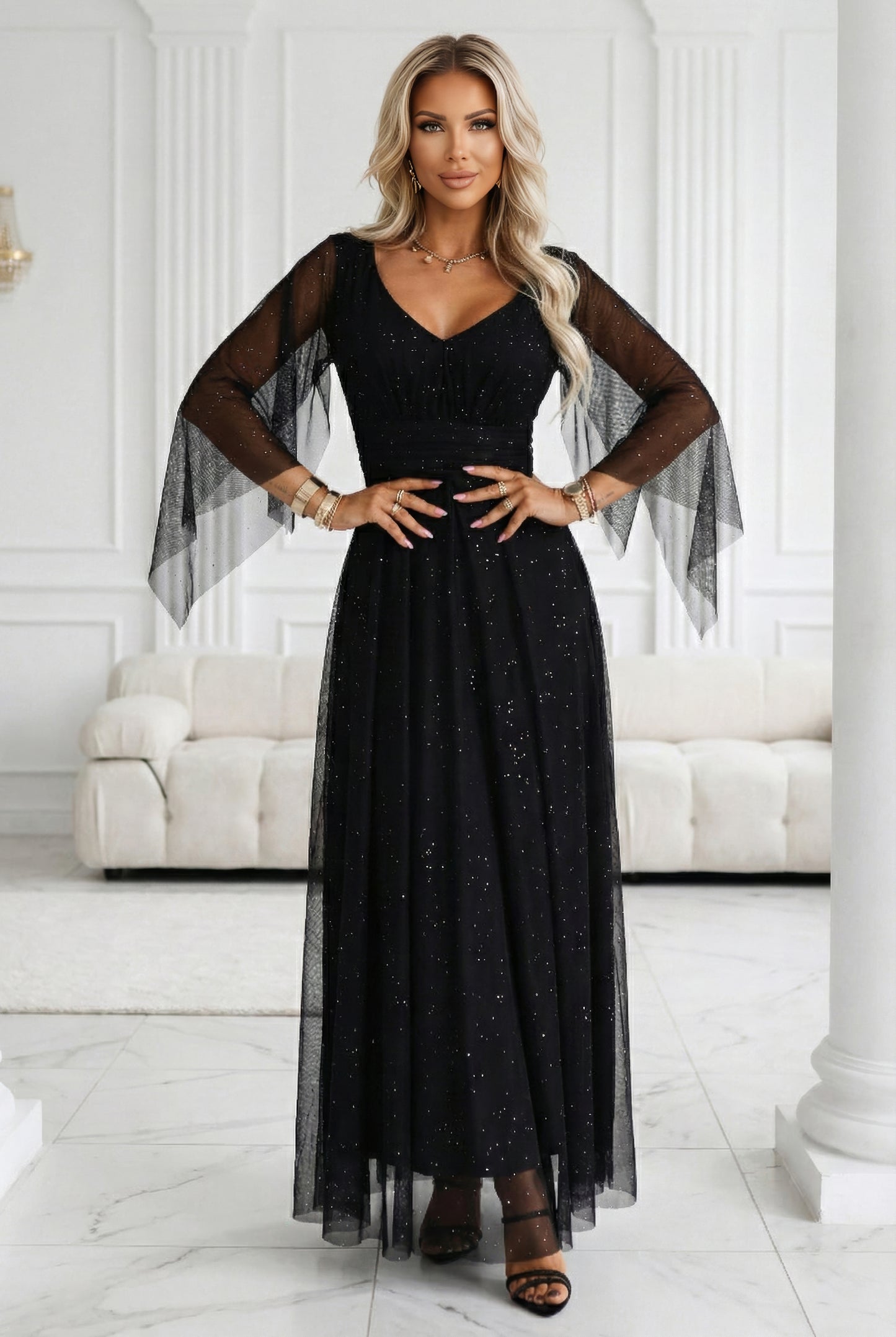 655-1 Long, shimmering dress with a neckline and transparent sleeves - black