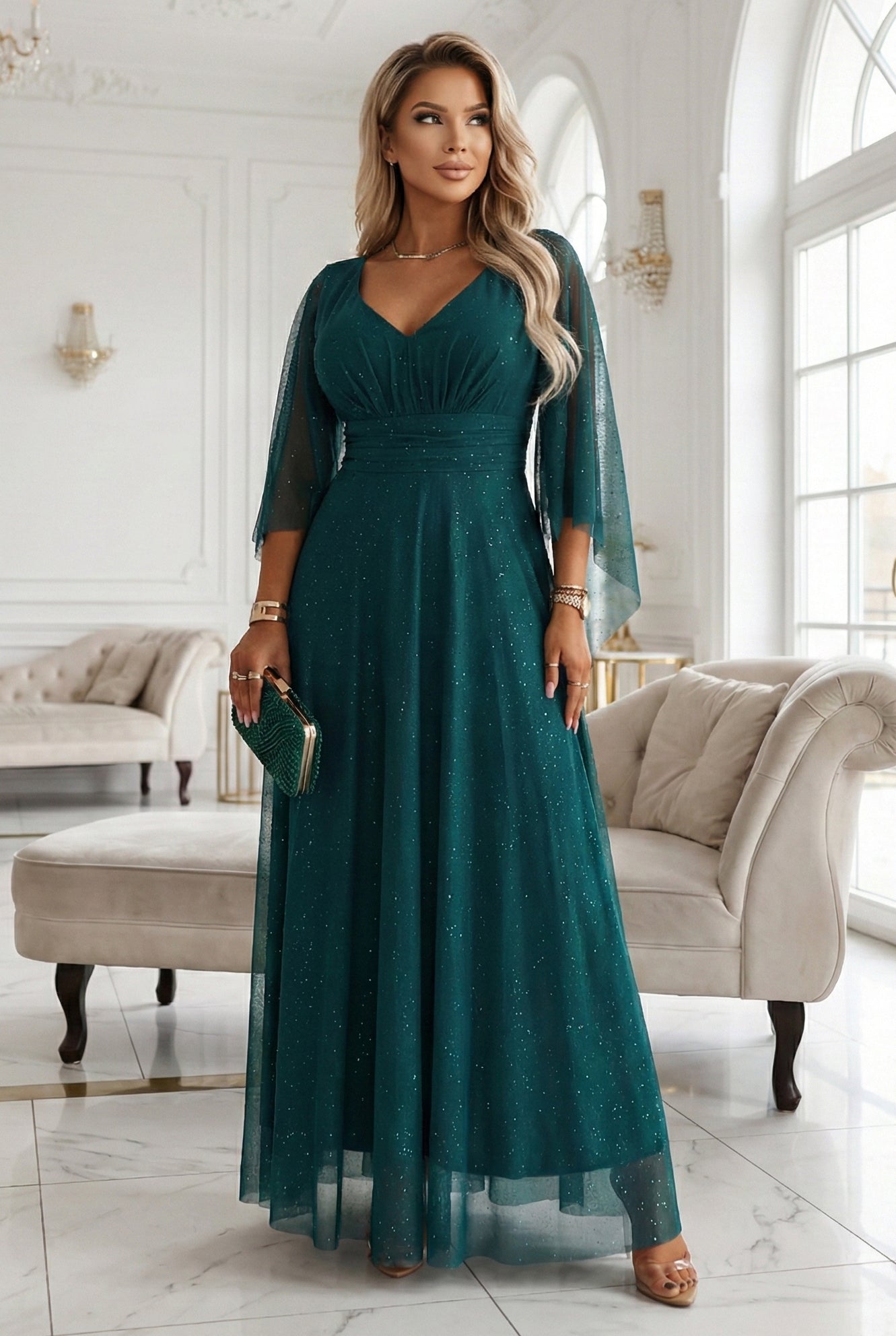 655-2 A long, shimmering dress with a plunging neckline and sheer sleeves - emerald green