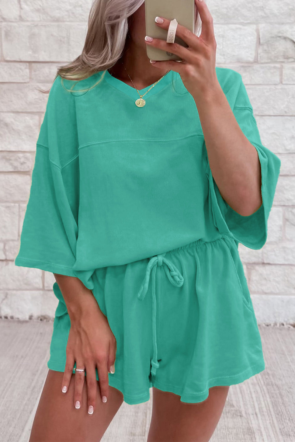 Meadow Mist Green Solid Loose V Neck Half Sleeve Tee and Shorts Set