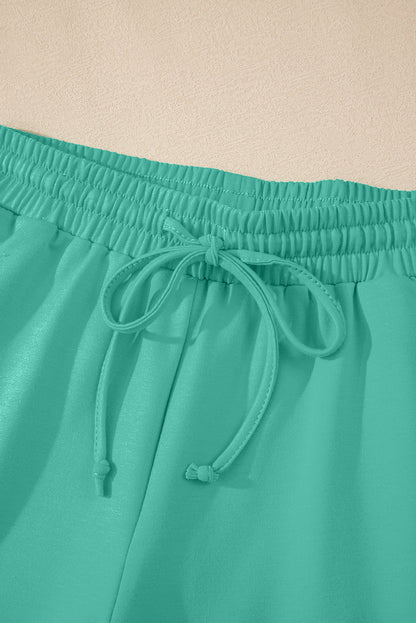 Meadow Mist Green Solid Loose V Neck Half Sleeve Tee and Shorts Set