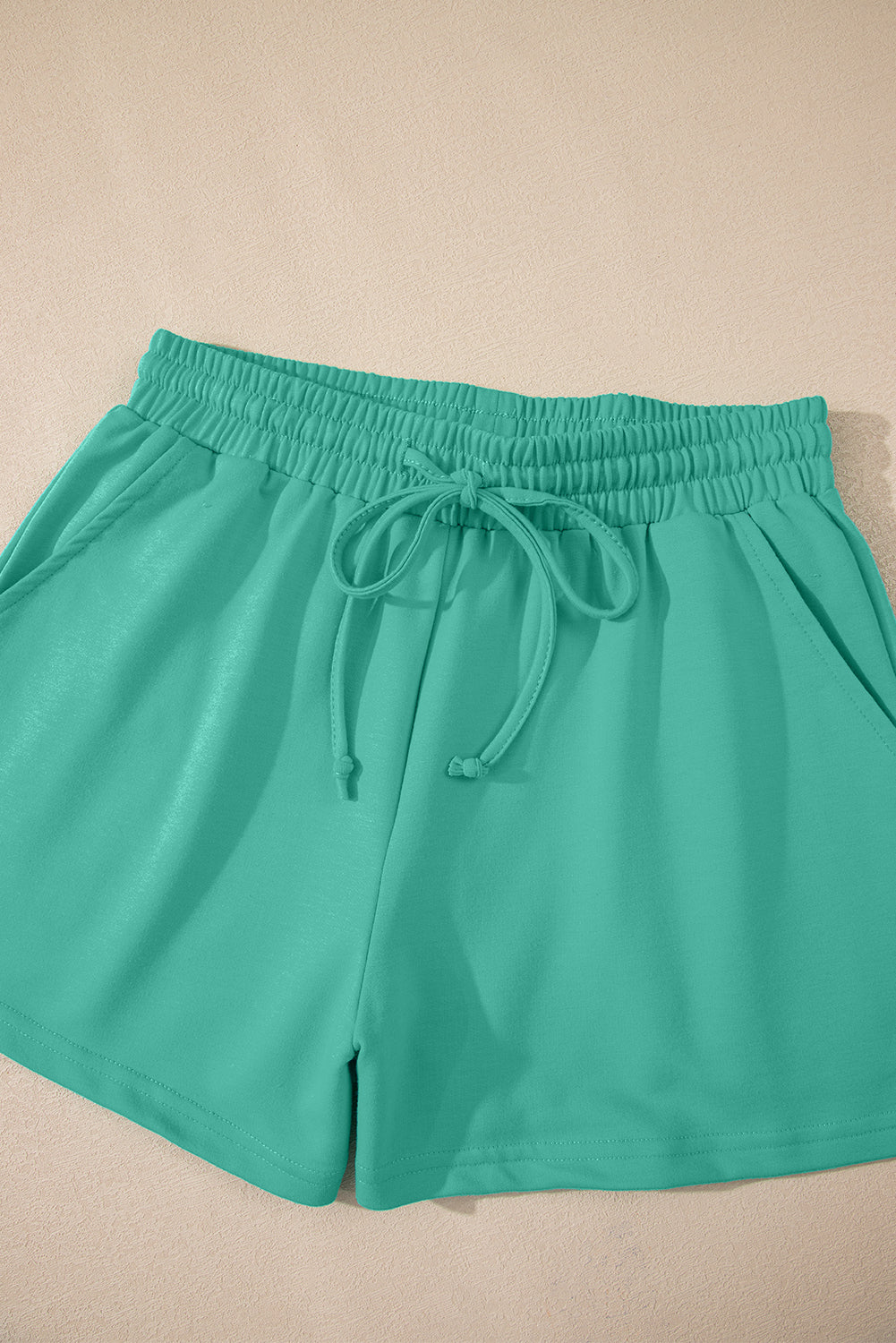 Meadow Mist Green Solid Loose V Neck Half Sleeve Tee and Shorts Set