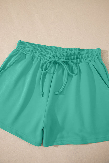 Meadow Mist Green Solid Loose V Neck Half Sleeve Tee and Shorts Set