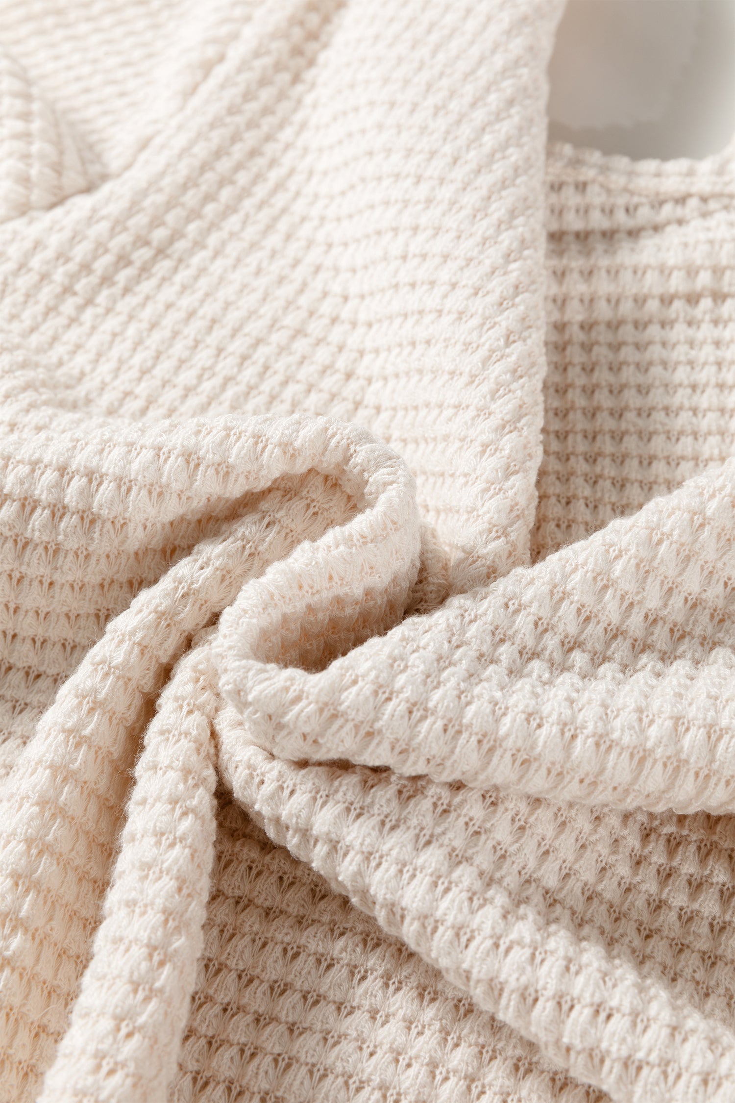 Jet Stream Solid Color Textured Knit Asymmetric Shoulder Long Sleeve Top