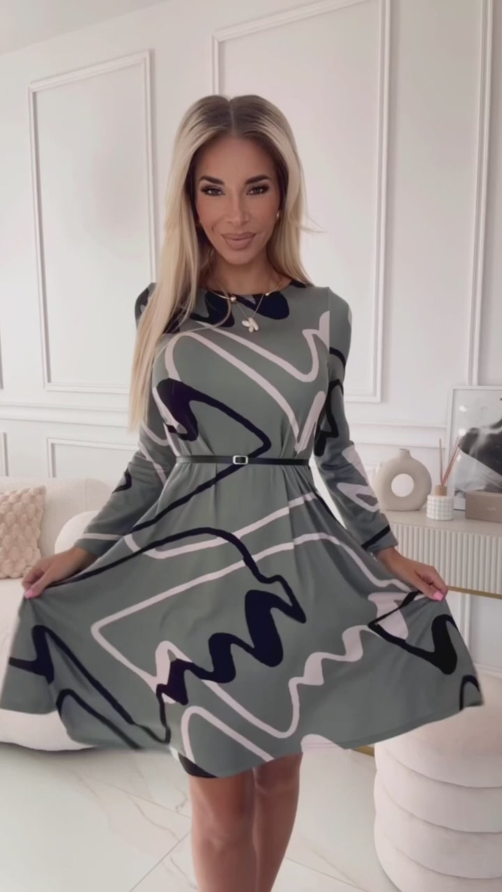 Load video: 576-1 A-line sweater dress with a belt - olive with a black and beige pattern