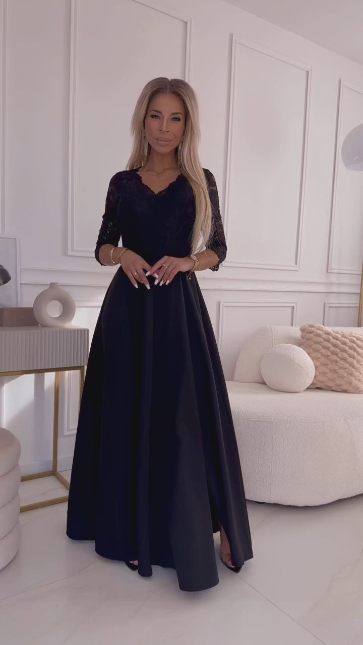 Video laden: 309-11 AMBER lace, elegant long dress with a neckline and leg slit - black