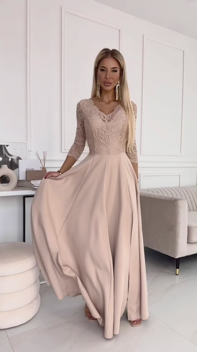 Video laden: 309-10 AMBER lace, elegant long dress with a neckline and leg slit - beige