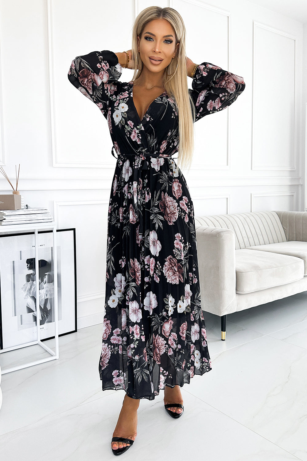 502-1 Pleated midi dress with a neckline, long sleeves and a tie at the waist - black with pink flowers